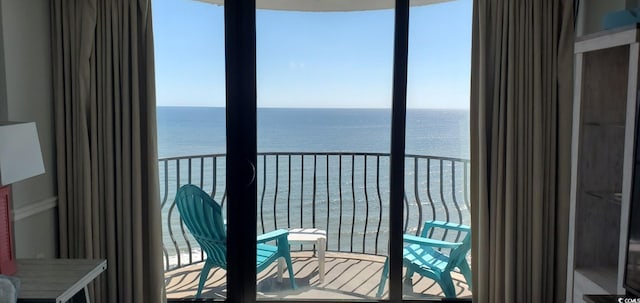 balcony featuring a water view