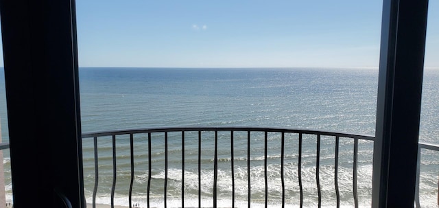 property view of water featuring a beach view