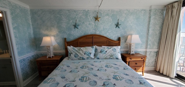 bedroom with ornamental molding