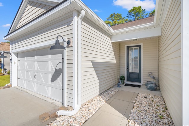 entrance to property featuring a garage