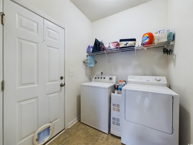 laundry room featuring separate washer and dryer