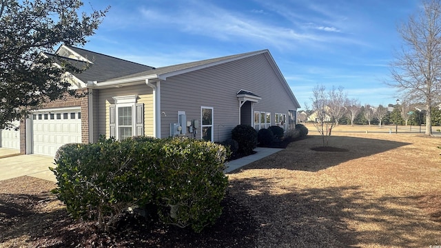 view of property exterior with a garage