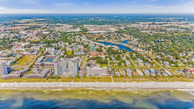 aerial view with a beach view and a water view