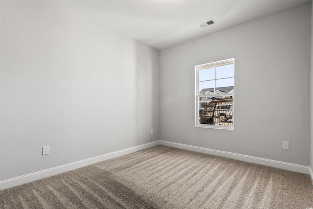 view of carpeted spare room