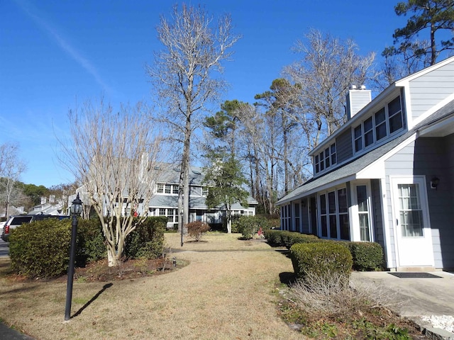 exterior space featuring a sunroom