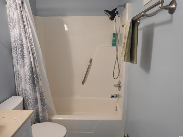 full bathroom featuring toilet, shower / tub combo, and vanity