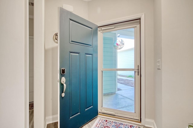 doorway featuring hardwood / wood-style flooring