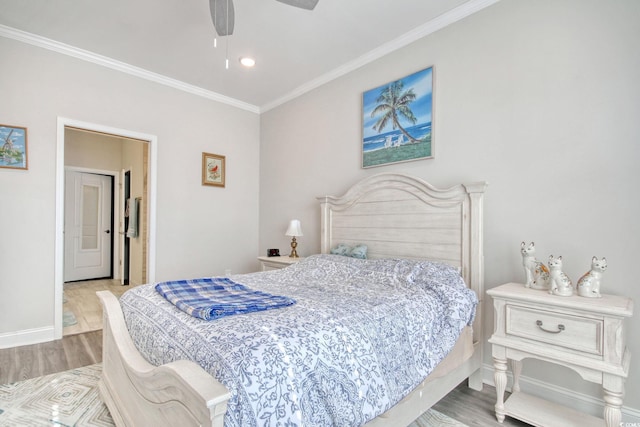 bedroom with ceiling fan, light wood-type flooring, and ornamental molding