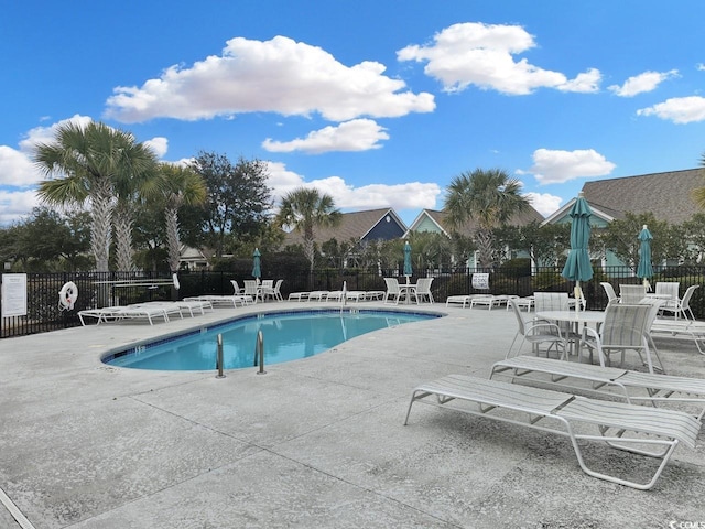 view of pool featuring a patio