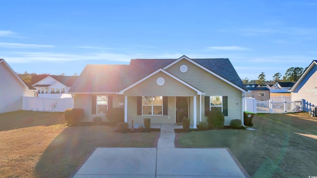 view of front of home with a front lawn