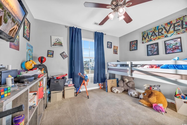 carpeted bedroom with ceiling fan