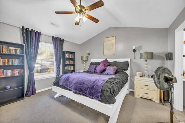 carpeted bedroom with lofted ceiling and ceiling fan