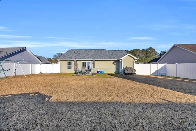 view of front of property with a front lawn