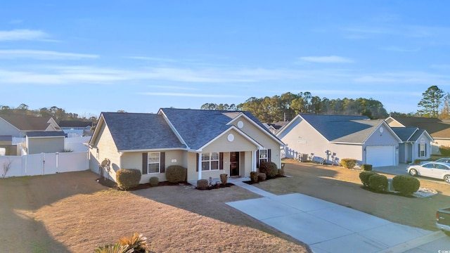 ranch-style home featuring a garage