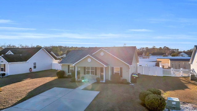 view of front of property featuring central AC and a patio area