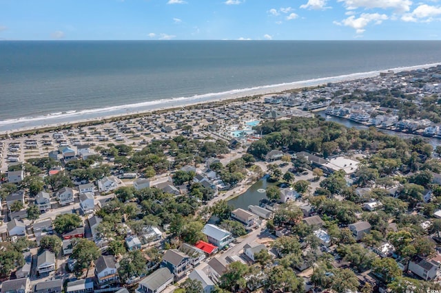 bird's eye view featuring a beach view and a water view