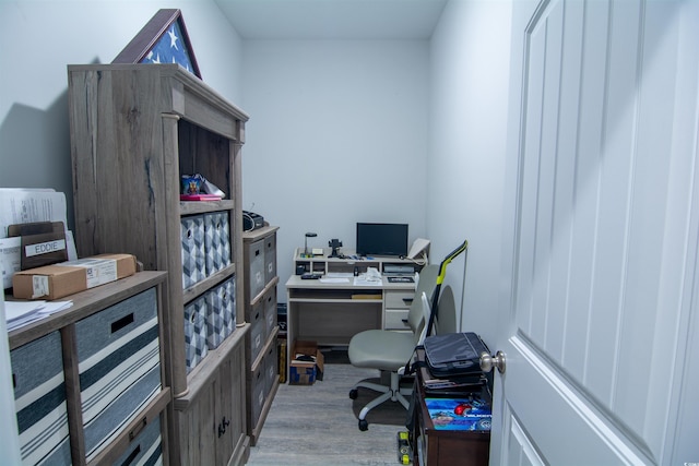 office area with light hardwood / wood-style floors