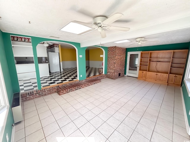 interior space featuring ceiling fan