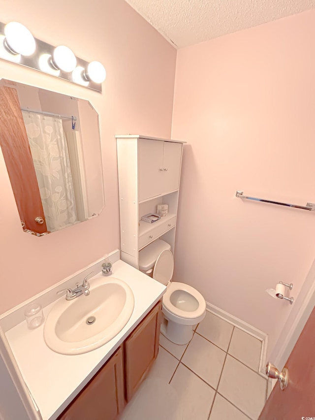 bathroom featuring a textured ceiling, tile patterned flooring, vanity, toilet, and a shower with shower curtain