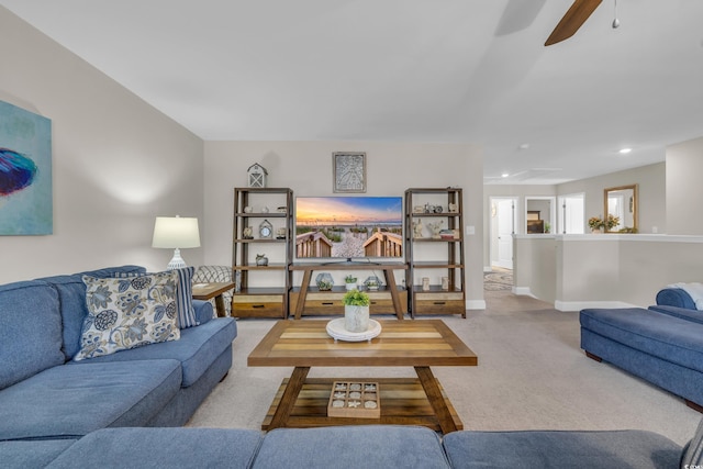 living area with light carpet, ceiling fan, baseboards, and recessed lighting