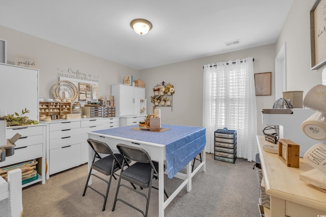 dining area featuring visible vents