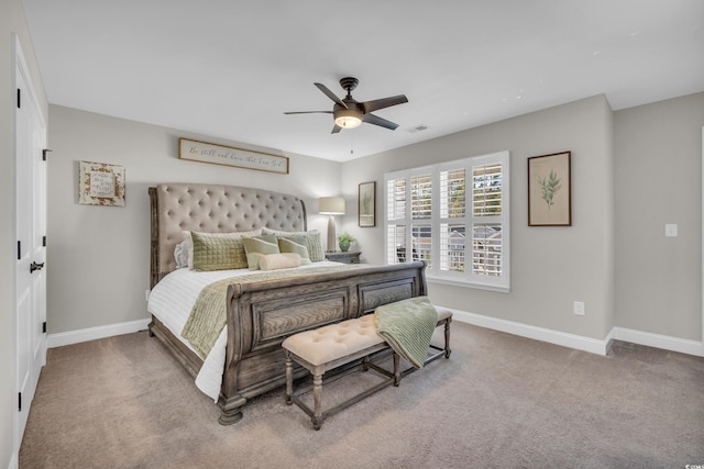 bedroom with carpet, visible vents, ceiling fan, and baseboards