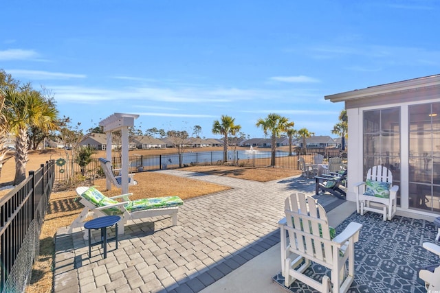 view of patio with a residential view and a fenced backyard