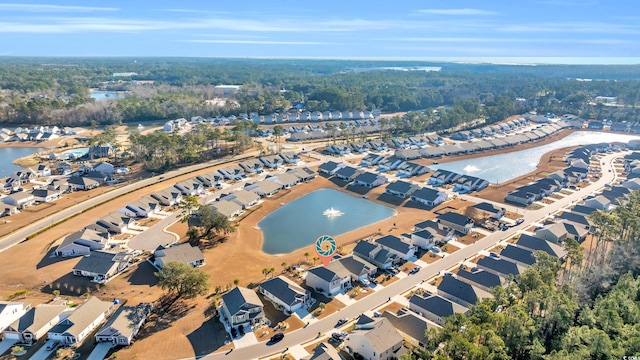 aerial view with a water view and a residential view