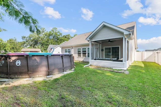 160 Maggie Way, Myrtle Beach, SC 29588 - rear view of house with an outdoor pool, a gate, a fenced backyard, and a ceiling fan