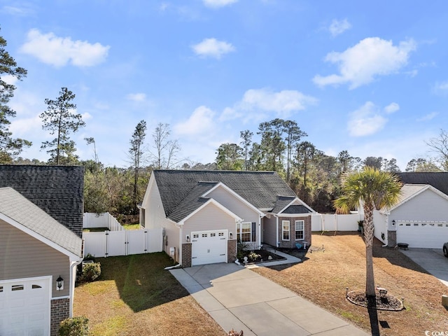 view of front facade with a garage and a front lawn