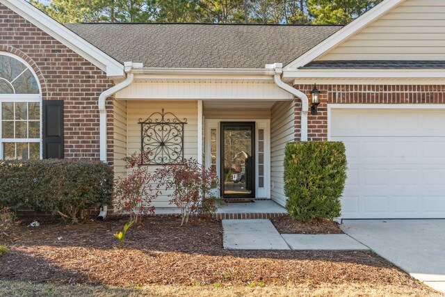 property entrance with a garage