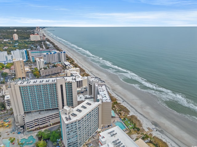 birds eye view of property featuring a water view and a view of the beach