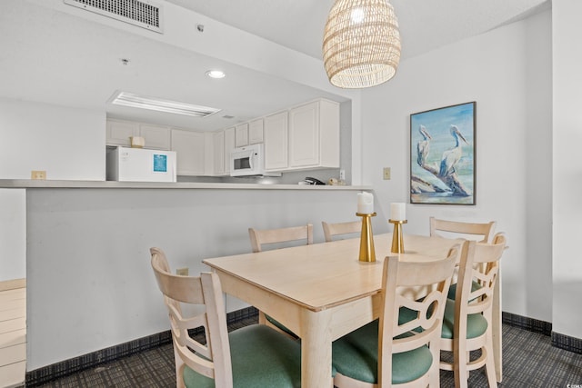 dining room with an inviting chandelier