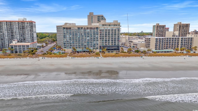 property's view of city with a beach view and a water view