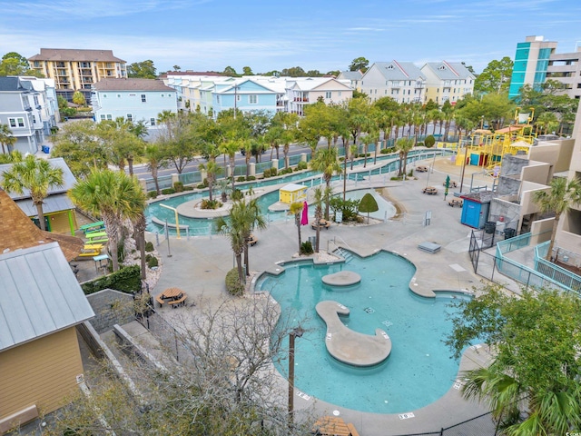 view of swimming pool with a patio