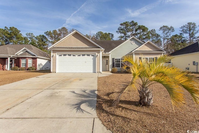 ranch-style home featuring a garage