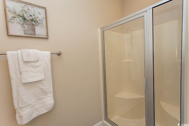 bathroom featuring walk in shower