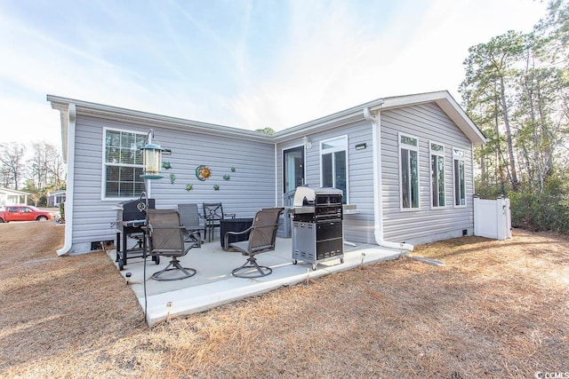 rear view of house with a patio area