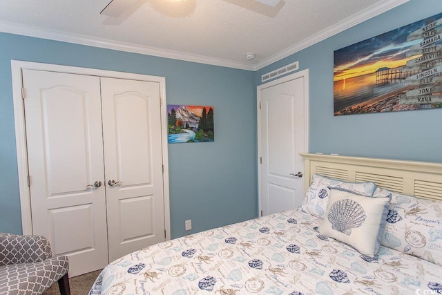 bedroom featuring a textured ceiling, a closet, crown molding, carpet, and ceiling fan