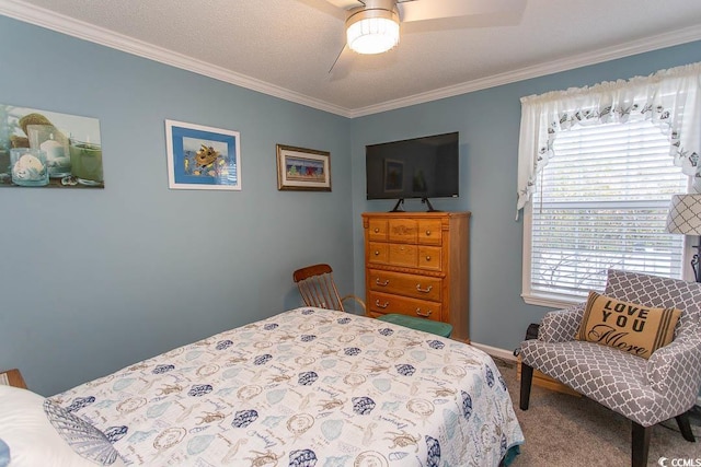 bedroom featuring multiple windows, a textured ceiling, ceiling fan, and crown molding