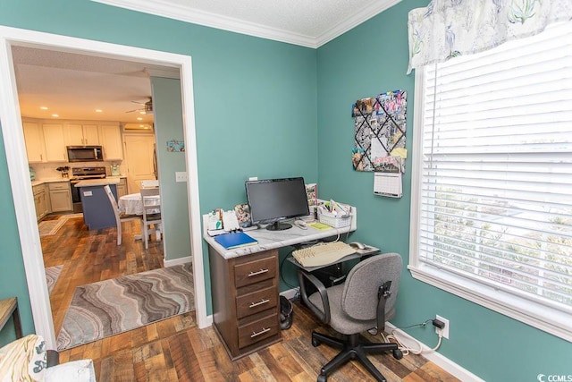 office area with ceiling fan, ornamental molding, and dark hardwood / wood-style flooring