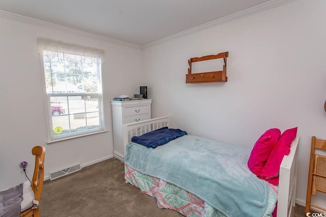 bedroom featuring crown molding and carpet