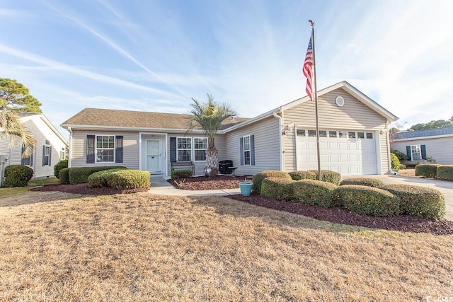 ranch-style home featuring a front yard and a garage