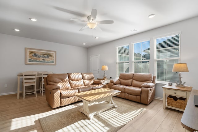 living room with ceiling fan