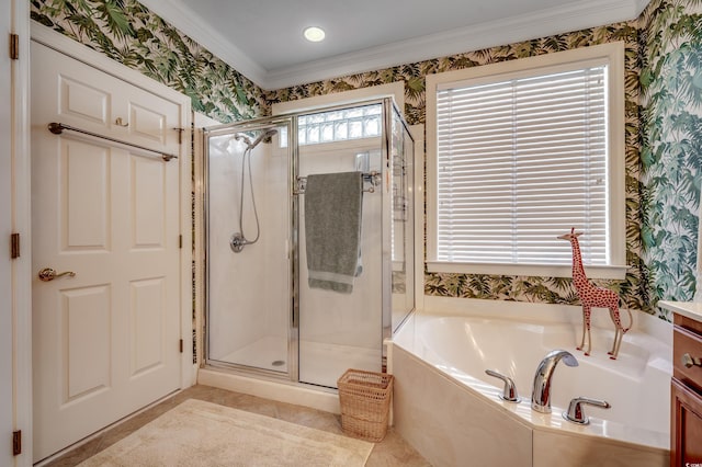 bathroom featuring ornamental molding, separate shower and tub, and vanity