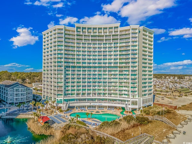 view of building exterior featuring a water view