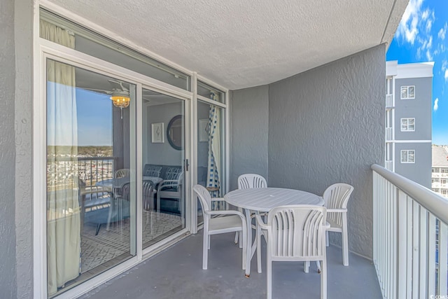 balcony featuring outdoor dining area