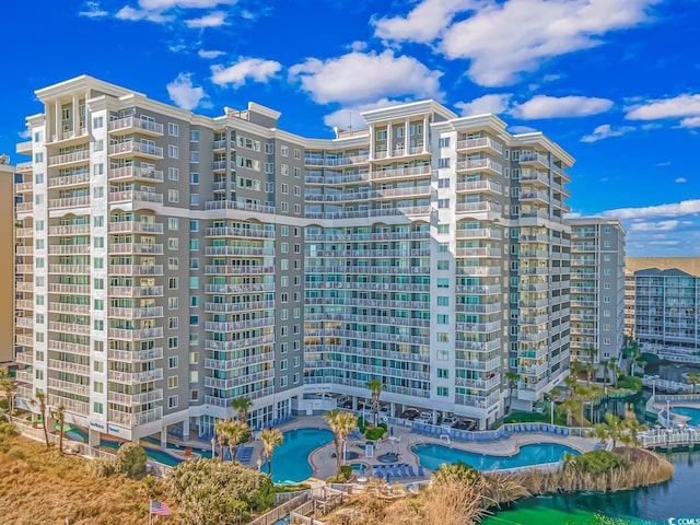 view of property with a water view