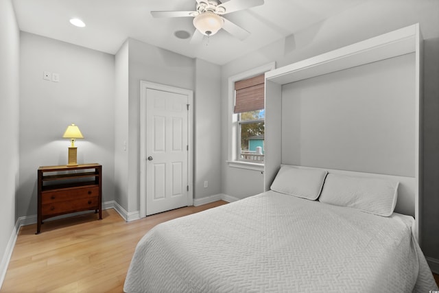 bedroom featuring ceiling fan and wood-type flooring