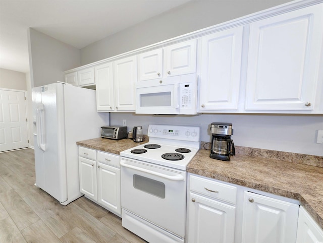 kitchen featuring white appliances, light hardwood / wood-style flooring, and white cabinetry